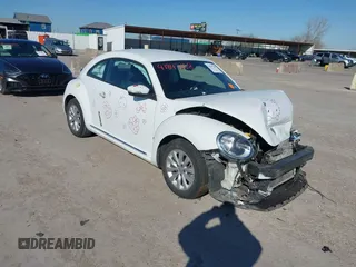 2019 Volkswagen Beetle S with VIN 3VWFD7AT9KM707398, listed as a IAAI auction lot 41847108 with 71,081 mi miles and . Bid and sale history available at DreamBid. Image 1.
