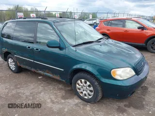 2005 Kia Sedona LX with VIN KNDUP132256743425, listed as a IAAI auction lot 42183166 with 133,719 mi miles. Bid and sale history available at carsss.com. Image 1.