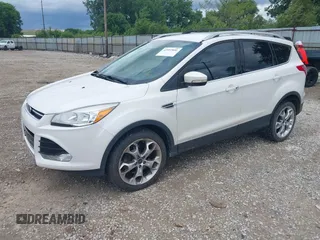 2016 Ford Escape Titanium z VIN 1FMCU9J90GUC76504, wystawiony jako IAAI lot #42552851 z przebiegiem 89 570 mil mil oraz . Historia ofert i sprzedaży dostępna na DreamBid. Obrazek 18.