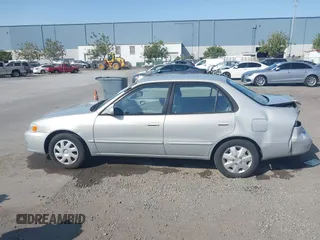 2002 Toyota Corolla CE with VIN 1NXBR12EX2Z637420, listed as a IAAI auction lot 42433300 with 98,353 mi miles and . Bid and sale history available at DreamBid. Image 14.