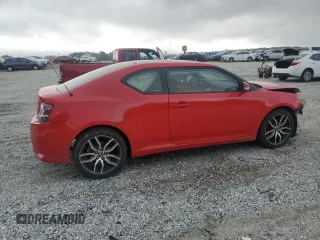 2014 Scion tC z VIN JTKJF5C79E3079305, wystawiony jako Copart lot #51750825 z przebiegiem 175 801 mil mil oraz Szkoda całkowita • Salvage title. Historia ofert i sprzedaży dostępna na DreamBid. Obrazek 3.