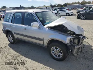 2000 Honda CR-V EX with VIN JHLRD1863YC002722, listed as a Copart auction lot 77416684 with 260,216 mi miles and Salvage Title. Bid and sale history available at carsss.com. Image 4.