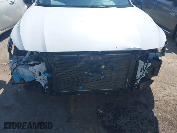 2022 Nissan Altima SR with VIN 1N4BL4CV6NN404337, listed as a IAAI auction lot 41856649 with 52,903 mi miles and . Bid and sale history available at DreamBid. Image 6.