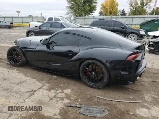 2022 Toyota GR Supra 3.0 with VIN WZ1DB0C06NW052360, listed as a Copart auction lot 79056304 with 12,060 mi miles and Salvage Title. Bid and sale history available at carsss.com. Image 2.
