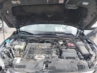 2019 Honda Civic LX with VIN 19XFC2F68KE007409, listed as a IAAI auction lot 41887406 with 57,147 mi miles and . Bid and sale history available at DreamBid. Image 10.