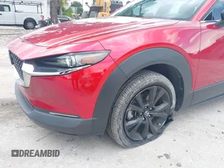 2023 Mazda CX-30 Premium с VIN 3MVDMBDY3PM507398, выставлен на аукционе IAAI как лот 42533176 с пробегом 15 788 миль миль и . История ставок и продаж доступна на DreamBid. Изображение 6.