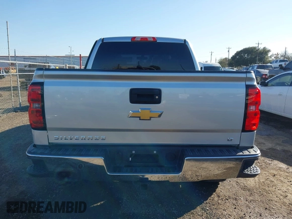 2018 Chevrolet Silverado 1500 LT with VIN 3GCPCREC9JG574686, listed as a IAAI auction lot 41676124 with 74,239 mi miles and . Bid and sale history available at DreamBid. Image 16.