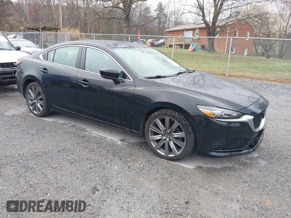 2018 Mazda 6 Touring with VIN JM1GL1VM2J1313540, listed as a IAAI auction lot 41850108 with 142,831 mi miles. Bid and sale history available at carsss.com. Image 1.