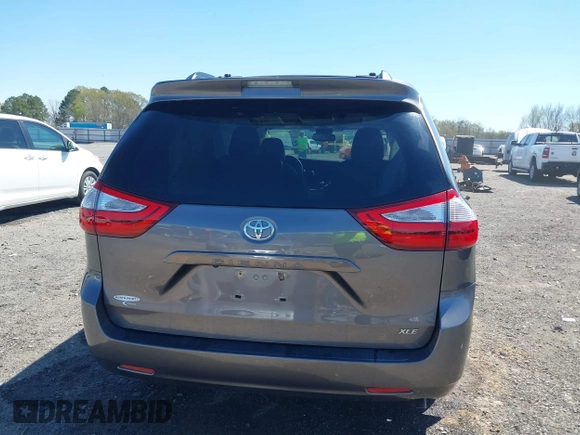 2015 Toyota Sienna XLE with VIN 5TDYK3DC4FS634937, listed as a IAAI auction lot 41869781 with 65,561 mi miles and . Bid and sale history available at carsss.com. Image 16.