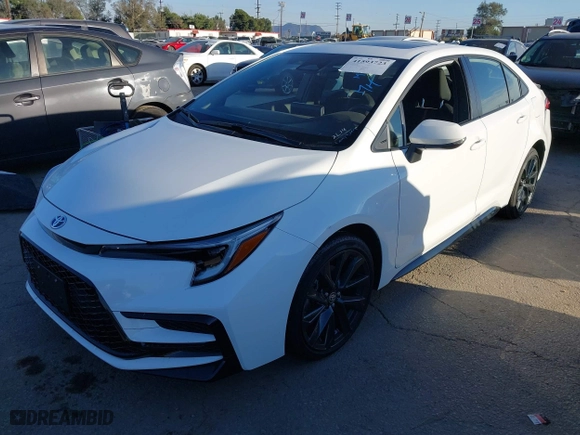 2024 Toyota Corolla Hybrid LE with VIN JTDBCMFE3R3044984, listed as a IAAI auction lot 41593723 with 1,702 mi miles. Bid and sale history available at carsss.com. Image 2.
