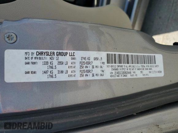 2013 Dodge Grand Caravan SXT with VIN 2C4RDGCG9DR628406, listed as a Copart auction lot 56484915 with 16,823 mi miles and Clean Title. Bid and sale history available at DreamBid. Image 13.