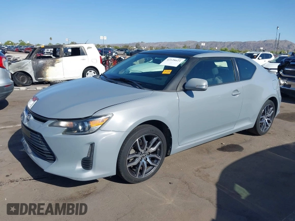 2015 Scion tC with VIN JTKJF5C7XFJ012872, listed as a IAAI auction lot 42128621 with 100,832 mi miles. Bid and sale history available at carsss.com. Image 18.