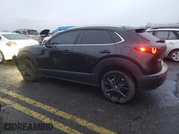 2022 Mazda CX-30 2.5 Turbo with VIN 3MVDMBAY6NM431211, listed as a Copart auction lot 81395264 with 30,205 mi miles and Salvage Title. Bid and sale history available at DreamBid. Image 2.