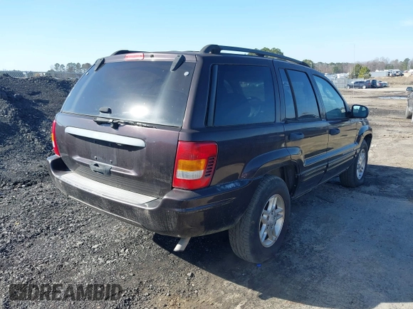 2004 Jeep Grand Cherokee with VIN 1J8GX48S24C266933, listed as a IAAI auction lot 41497122 with 200,899 mi miles and . Bid and sale history available at DreamBid. Image 4.