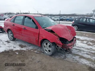 2007 Ford Focus S z VIN 1FAFP34N57W168579, wystawiony jako IAAI lot #41617708 z przebiegiem Nie podano mil oraz . Historia ofert i sprzedaży dostępna na DreamBid. Obrazek 1.