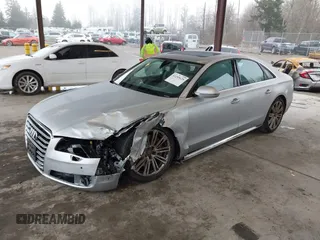 2013 Audi A8 4.0L с VIN WAUA2AFD5DN017770, выставлен на аукционе IAAI как лот 41255625 с пробегом 115 993 миль миль и . История ставок и продаж доступна на DreamBid. Изображение 17.