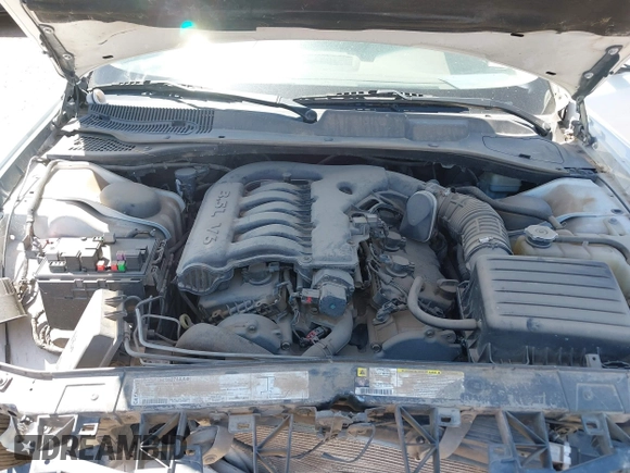 2010 Dodge Charger SXT with VIN 2B3CA3CV5AH297994, listed as a IAAI auction lot 42153457 with 157,017 mi miles. Bid and sale history available at carsss.com. Image 10.