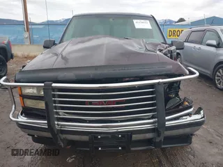 1997 GMC Yukon with VIN 1GKEK13R0VJ755574, listed as a IAAI auction lot 41158932 with 212,668 mi miles. Bid and sale history available at carsss.com. Image 13.