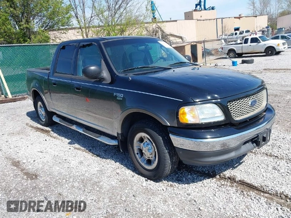 2003 Ford F-150 XLT with VIN 1FTRW07653KC18900, listed as a IAAI auction lot 41979710 with 99,525 mi miles. Bid and sale history available at carsss.com. Image 1.