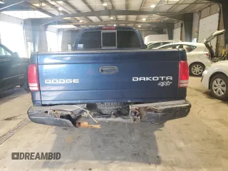 2004 Dodge Dakota z VIN 1D7GG16KX4S586053, wystawiony jako Copart lot #60221585 z przebiegiem 150 150 mil mil oraz Szkoda całkowita • Salvage title. Historia ofert i sprzedaży dostępna na DreamBid. Obrazek 6.