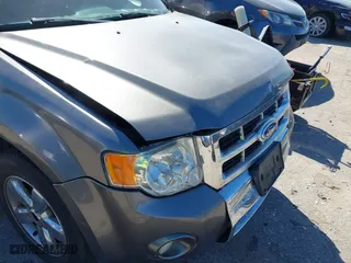 2011 Ford Escape Limited with VIN 1FMCU0EG2BKA67855, listed as a IAAI auction lot 41808002 with 183,476 mi miles. Bid and sale history available at carsss.com. Image 6.