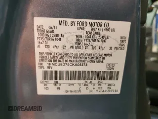 2012 Ford Escape XLT z VIN 1FMCU9D75CKA05373, wystawiony jako Copart lot #63442495 z przebiegiem 117 756 mil mil oraz Szkoda całkowita • Salvage title. Historia ofert i sprzedaży dostępna na DreamBid. Obrazek 13.