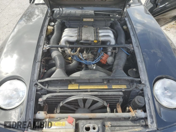 1980 Porsche 928 z VIN 92A0810156, wystawiony jako Copart lot #76952224 z przebiegiem 91 484 mil mil oraz Szkoda całkowita • Salvage title. Historia ofert i sprzedaży dostępna na DreamBid. Obrazek 11.