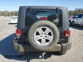 2009 Jeep Wrangler Unlimited X with VIN 1J4GA391X9L788932, listed as a Copart auction lot 49004925 with 105,674 mi miles and Salvage Title. Bid and sale history available at carsss.com. Image 6.