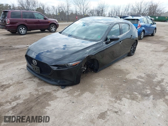 2021 Mazda 3 2.5 Turbo with VIN JM1BPBJY0M1344335, listed as a IAAI auction lot 42008145 with 71,452 mi miles and . Bid and sale history available at DreamBid. Image 2.