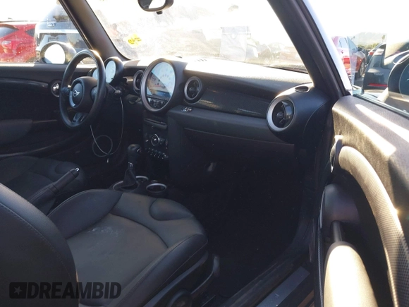 2012 MINI Convertible S with VIN WMWZP3C53CT550336, listed as a IAAI auction lot 40857283 with 51,111 mi miles and . Bid and sale history available at DreamBid. Image 5.