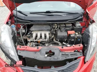 2009 Honda Fit z VIN JHMGE88259S058142, wystawiony jako Copart lot #47468175 z przebiegiem 67 704 mil mil oraz Szkoda całkowita • Salvage title. Historia ofert i sprzedaży dostępna na DreamBid. Obrazek 11.