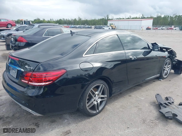 2017 Mercedes-Benz E-Class E 400 with VIN WDDKJ6HBXHF353634, listed as a IAAI auction lot 41203314 with 106,531 mi miles. Bid and sale history available at carsss.com. Image 4.
