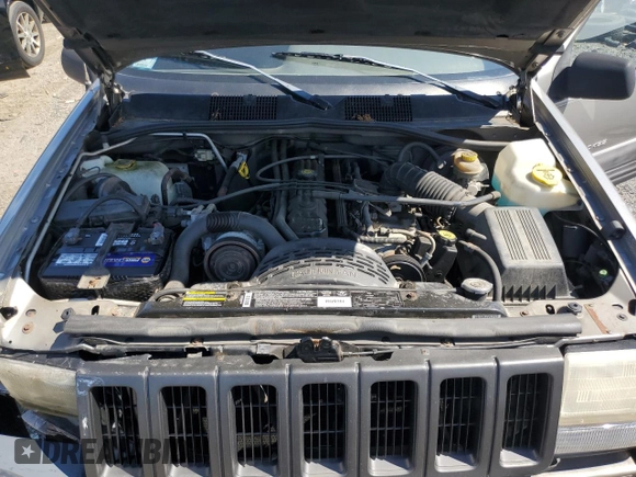1998 Jeep Grand Cherokee Laredo z VIN 1J4GZ58S4WC278490, wystawiony jako Copart lot #62388535 z przebiegiem 133 896 mil mil oraz Czysty tytuł • Clean title. Historia ofert i sprzedaży dostępna na DreamBid. Obrazek 12.