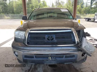 2012 Toyota Tundra with VIN 5TFUY5F13CX259312, listed as a IAAI auction lot 42547918 with 182,190 mi miles and . Bid and sale history available at DreamBid. Image 13.