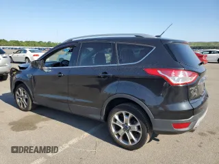 2015 Ford Escape Titanium with VIN 1FMCU0J95FUB59026, listed as a Copart auction lot 65047545 with 84,259 mi miles and Salvage title. Bid and sale history available at DreamBid. Image 2.