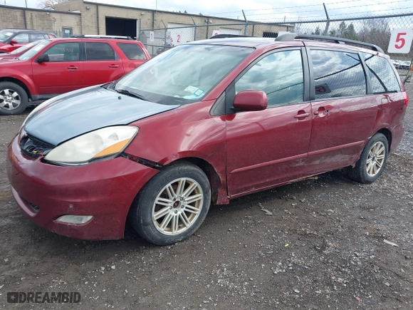 2010 Toyota Sienna XLE with VIN 5TDYK4CC0AS290006, listed as a IAAI auction lot 41929986 with 230,204 mi miles. Bid and sale history available at carsss.com. Image 23.