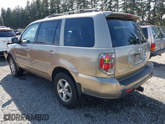 2006 Honda Pilot EX-L with VIN 2HKYF18566H561371, listed as a IAAI auction lot 41950296 with 145,579 mi miles and . Bid and sale history available at DreamBid. Image 3.