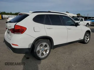 2015 BMW X1 sDrive28i with VIN WBAVM1C58FVZ93621, listed as a Copart auction lot 49897325 with 72,884 mi miles and Salvage Title. Bid and sale history available at carsss.com. Image 3.