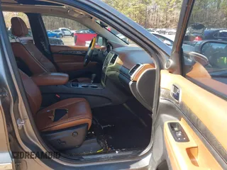 2012 Jeep Grand Cherokee Overland with VIN 1C4RJECT7CC105614, listed as a IAAI auction lot 41629174 with 264,756 mi miles. Bid and sale history available at carsss.com. Image 5.