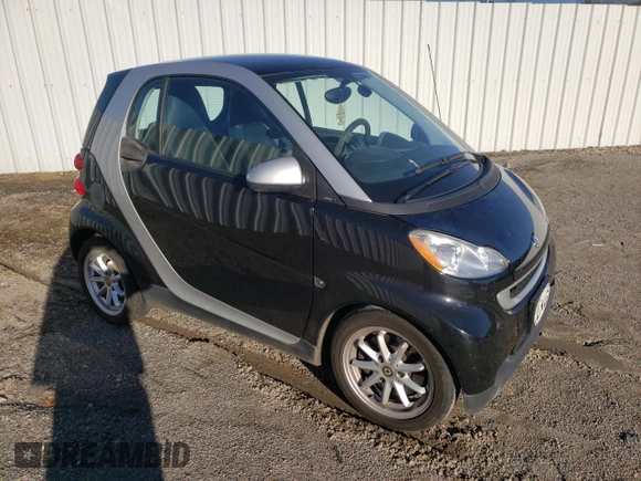 2008 Smart fortwo Pure z VIN WMEEJ31X78K128849, wystawiony jako Copart lot #44351215 z przebiegiem 144 175 mil mil oraz Tytuł czysty. Historia ofert i sprzedaży dostępna na DreamBid. Obrazek 4.