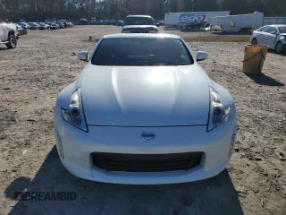 2014 Nissan 370Z Touring with VIN JN1AZ4EH1EM635411, listed as a Copart auction lot 82670344 with 77,501 mi miles and Salvage Title. Bid and sale history available at carsss.com. Image 5.