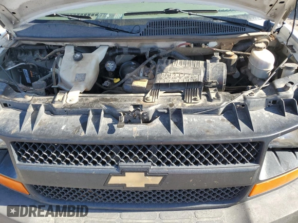 2013 Chevrolet Express Cargo с VIN 1GCWGFBA2D1115617, выставлен на аукционе Copart как лот 61756645 с пробегом 302 668 миль миль и Списание • Salvage title. История ставок и продаж доступна на DreamBid. Изображение 11.