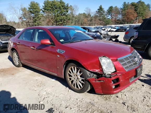 2009 Cadillac STS AWD z VIN 1G6DD67VX90138316, wystawiony jako Copart lot #80915524 z przebiegiem 112 290 mil mil oraz Czysty tytuł • Clean title. Historia ofert i sprzedaży dostępna na DreamBid. Obrazek 4.