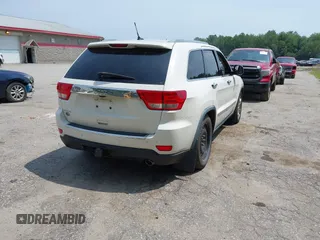 2011 Jeep Grand Cherokee Overland with VIN 1J4RR6GG3BC587857, listed as a IAAI auction lot 42879845 with 165,572 mi miles and . Bid and sale history available at DreamBid. Image 4.
