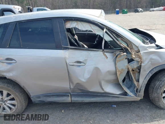 2015 Mazda CX-5 Touring with VIN JM3KE2CY6F0432910, listed as a IAAI auction lot 41784545 with 210,787 mi miles. Bid and sale history available at carsss.com. Image 13.