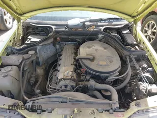 1987 Mercedes-Benz 300 with VIN WDBEA30DXHA466708, listed as a IAAI auction lot 41518078 with 166,202 mi miles. Bid and sale history available at carsss.com. Image 10.