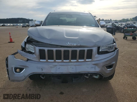 2016 Jeep Grand Cherokee Overland with VIN 1C4RJFCT2GC320247, listed as a Copart auction lot 50832195 with 104,300 mi miles and Salvage title. Bid and sale history available at DreamBid. Image 5.