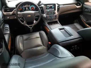 2018 Chevrolet Suburban Premier with VIN 1GNSCJKC4JR179631, listed as a Copart auction lot 75852974 with 82,008 mi miles and Salvage Title. Bid and sale history available at carsss.com. Image 8.