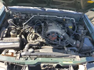 2000 Nissan Frontier XE with VIN 1N6ED27T0YC364061, listed as a Copart auction lot 61863515 with 226,867 mi miles and Clean title. Bid and sale history available at DreamBid. Image 11.