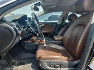 2012 Audi A7 Prestige with VIN WAU2GAFC1CN081915, listed as a Copart auction lot 59494105 with 169,556 mi miles and Salvage title. Bid and sale history available at DreamBid. Image 7.